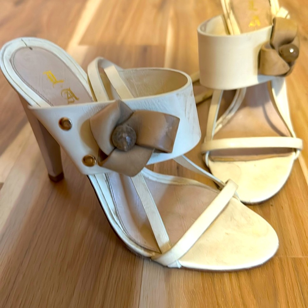 L.A.M.B. Strappy leather heels.